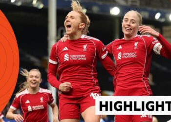 Liverpool's Ceri Holland celebrates with Grace Fisk