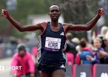 Albert Korir celebrating
