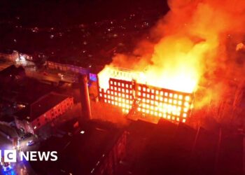 Arrest after major fire tears through historic mill