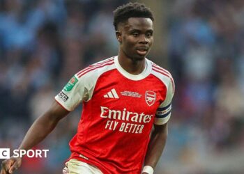 Bukayo Saka playing for Arsenal
