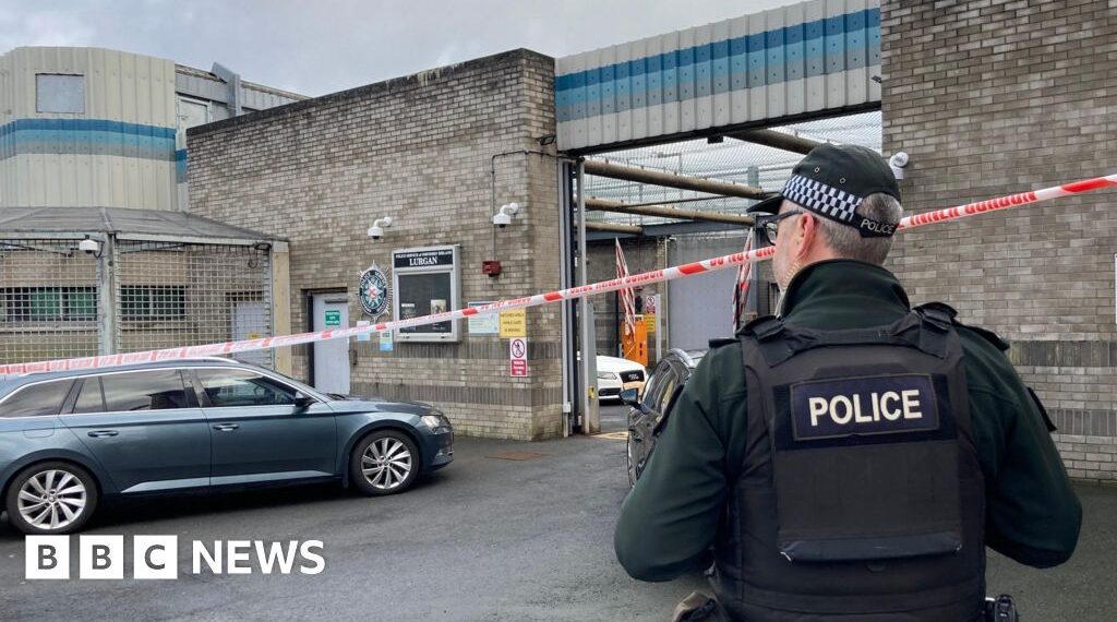 Delivery driver threatened at gunpoint in attack on police station