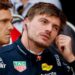 Max Verstappen removes his ear protectors after getting out of his Red Bull following qualifying for the Japanese Grand Prix