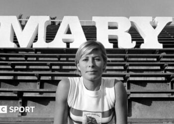 Mary Rand in action in the long jump at the 1964 Olympics