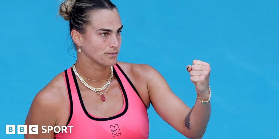 Aryna Sabalenka celebrates winning a point with a clenched fist