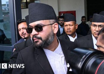 Nepal swears in ex-rapper as new prime minister