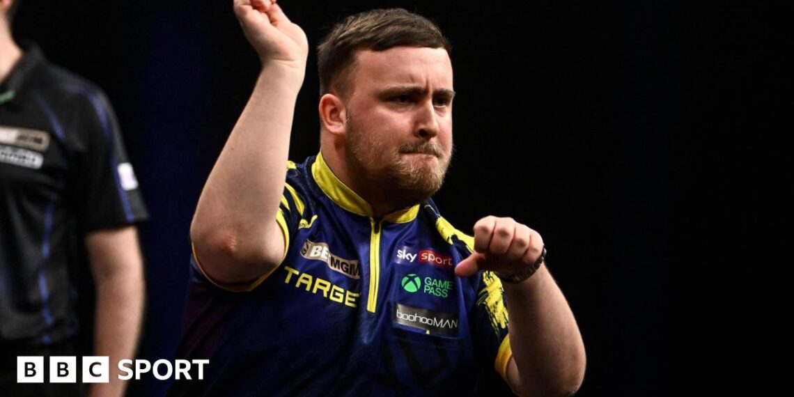 Luke Littler celebrates a 170 checkout