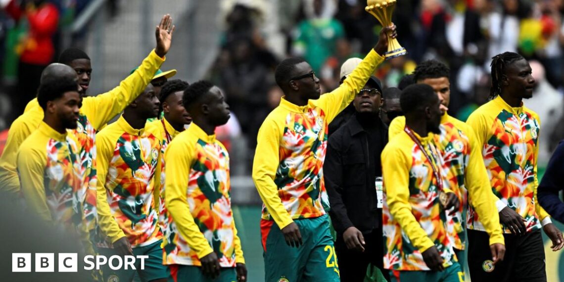 Senegal's players parade the Africa Cup of Nations trophy