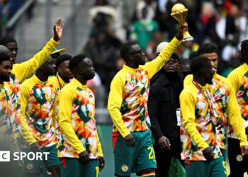 Senegal's players parade the Africa Cup of Nations trophy