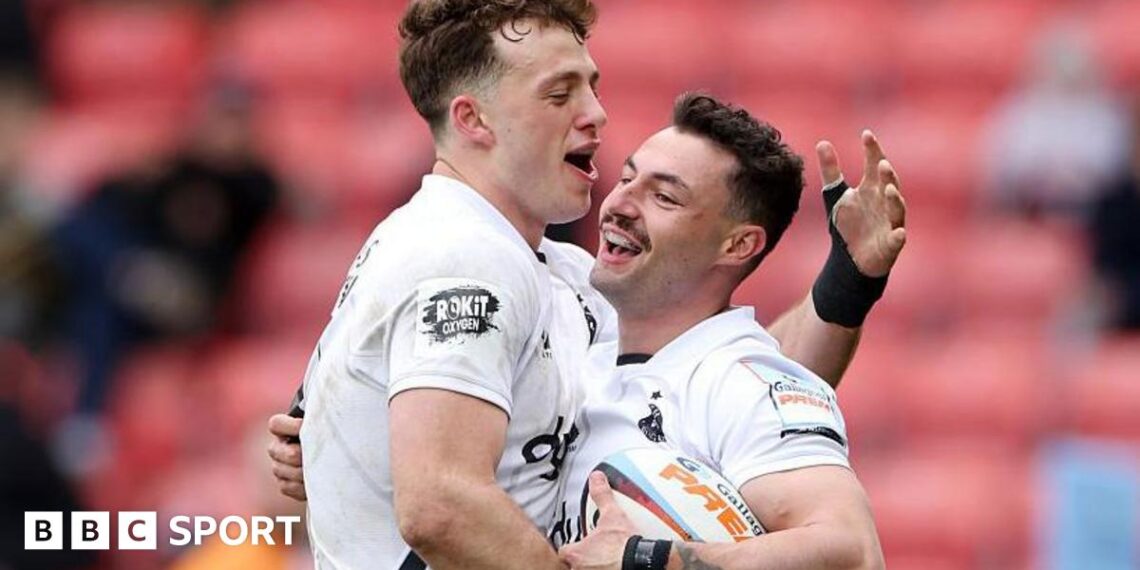 Bath's Bernard van der Linde hugs team-mate Louie Hennessey in celebration