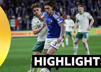 Califiori and Devenney compete for the ball