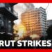 Israel pounds Beirut suburbs after Hezbollah launches rocket barrage | BBC News
