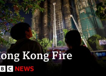 Firefighters search for missing after Hong Kong tower blocks fire | BBC News
