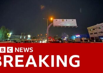 Iran launches missiles at US bases in Qatar and Iraq, state media reports | BBC News