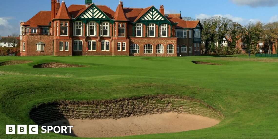 A view of a bunker in front of the 18th green at Royal Lytham & St Annes, with the clubhouse in the background