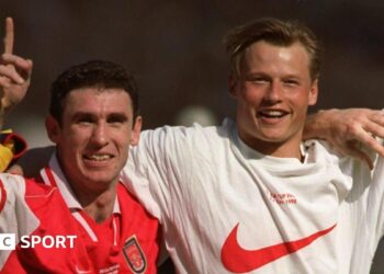 Martin Keown (left) and Alex Manninger celebrate together at Wembley after Arsenal's FA Cup final win over Newcastle in 1998