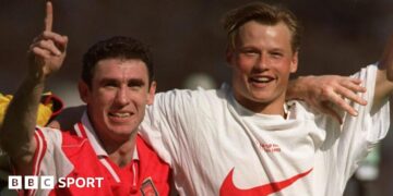 Martin Keown (left) and Alex Manninger celebrate together at Wembley after Arsenal's FA Cup final win over Newcastle in 1998