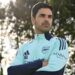 Arsenal manager Mikel Arteta poses with arms folded