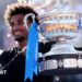 Arthur Fils holds the trophy after winning in Barcelona