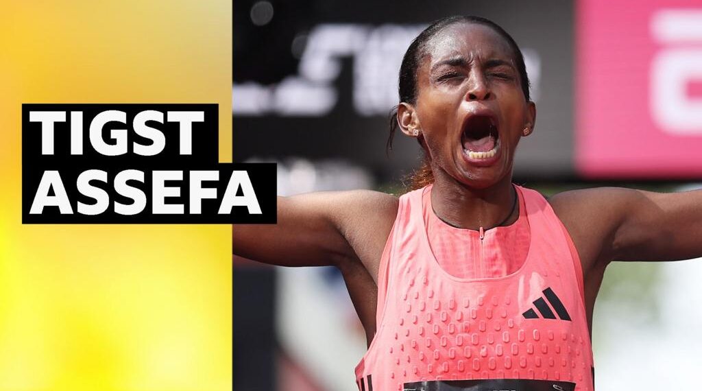 Tigst Assefa celebrates London Marathon win with eyes closed, mouth open and arms outstretched