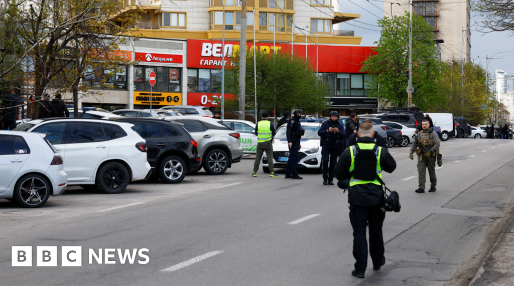 At least five killed in Kyiv as gunman opens fire and takes hostages