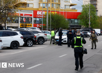 At least five killed in Kyiv as gunman opens fire and takes hostages