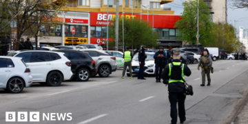 At least five killed in Kyiv as gunman opens fire and takes hostages