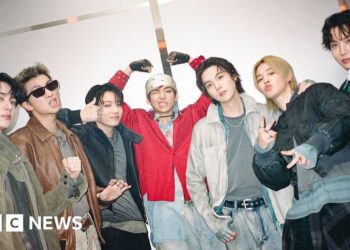 BTS battle torrential rain to kick off $1bn world tour