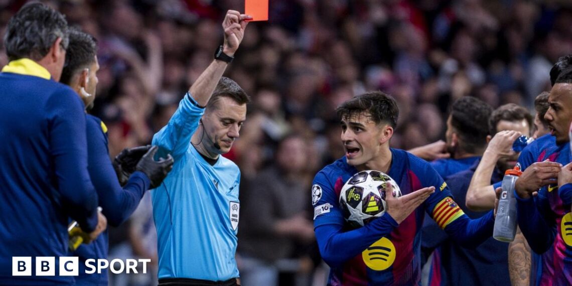 Referee Clement Turpin sends off Eric Garcia during Barcelona's Champions League second leg against Atletico Madrid in 2026 while his team-mate Pedri protests