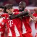Bayern Munich players celebrate scoring against Real Madrid