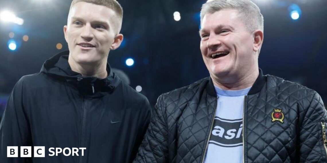Campbell Hatton (left) and his father Ricky Hatton before a Manchester City match