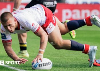 Hull KR's Mikey Lewis scores a try against York Knights