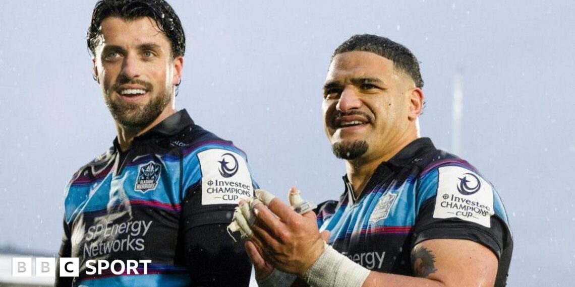 Adam Hastings and Sione Tuipulotu celebrate Glasgow's victory over Bulls