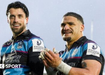 Adam Hastings and Sione Tuipulotu celebrate Glasgow's victory over Bulls