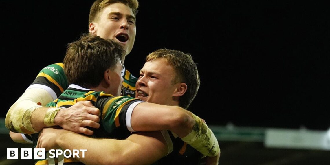 Northampton players celebrate a try