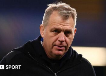 Chelsea chairman Todd Boehly looks on ahead of kick-off in the Blues' Champions League last-16 knockout match against Paris Saint-Germain at Stamford Bridge