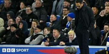 Liam Rosenior looking at the ground at Brighton