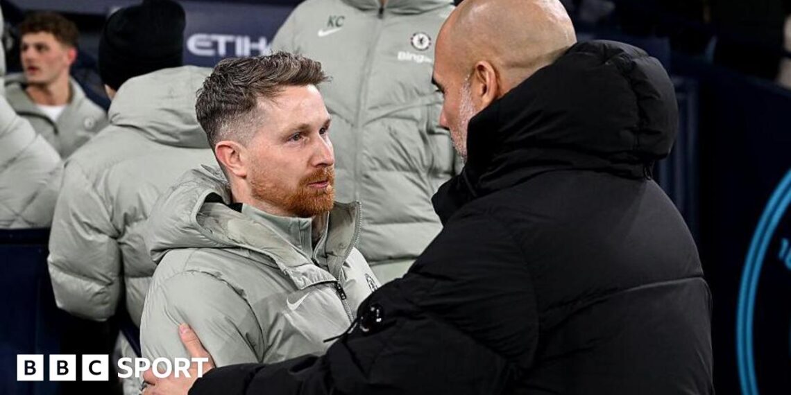Calum McFarlane embraces Pep Guardiola after drawing at Manchester City earlier in the season