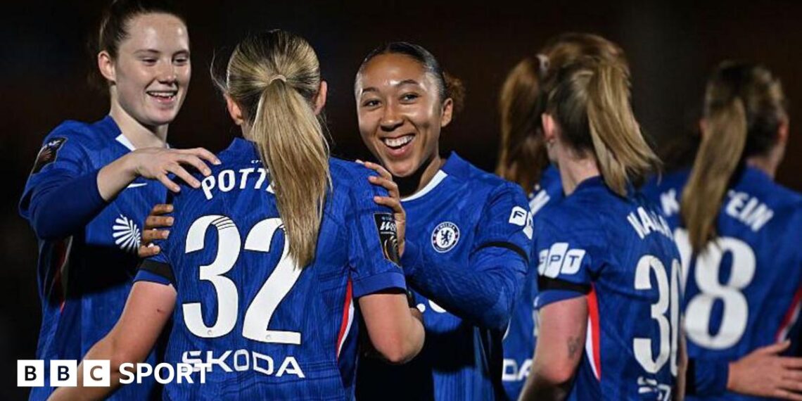 Chelsea women's players celebrate a goal
