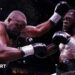 Derek Chisora is punched by Deontay Wilder
