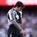 Newcastle's Sandro Tonali wipes his face with his shirt