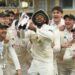 Haseeb Hameed lifts the County Championship trophy at Trent Bridge