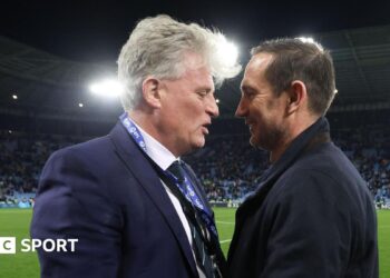 Doug King and Frank Lampard share a moment after Coventry's title-sealing win over Portsmouth