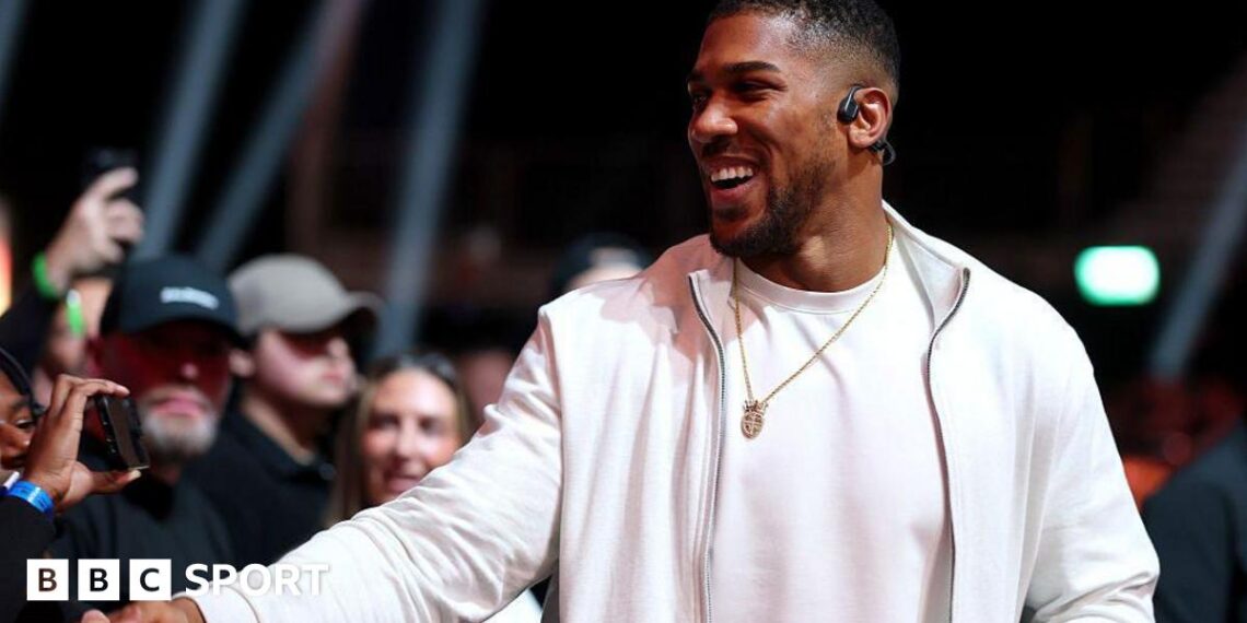 British boxer Anthony Joshua shakes hands at the fight between Deontay Wilder and Derek Chisora