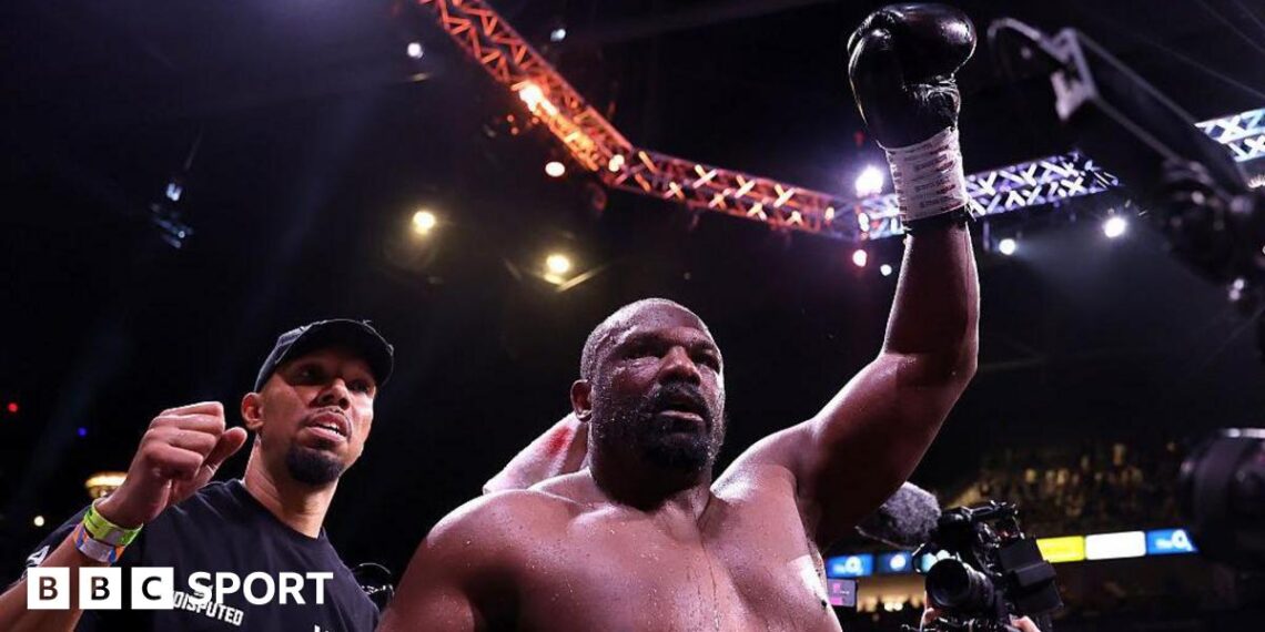 Derek Chisora celebrates after the Heavyweight fight with Deontay Wilder