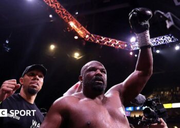 Derek Chisora celebrates after the Heavyweight fight with Deontay Wilder
