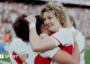 Ellie Kildunne hugging Tatyana Heard at full-time of the World Cup final