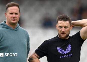 Rob Key and Brendon McCullum stand beside each other