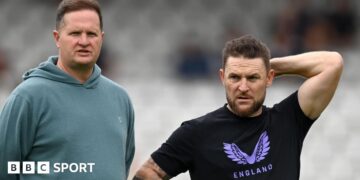 Rob Key and Brendon McCullum stand beside each other