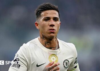 Enzo Fernandez wearing a white Chelsea shirt