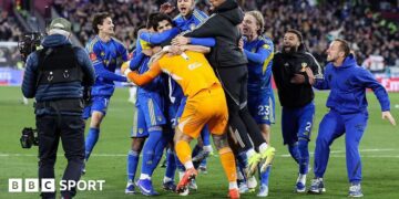 Leeds players celebrate reaching the FA Cup semi-finals